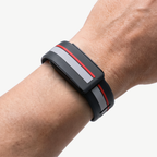 RaceStripe Band Crimson Noir — worn on wrist