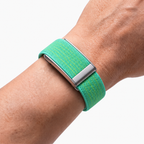 PulseWeave Band Acid Silver — worn on wrist