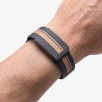 RaceStripe Band Khaki Noir — worn on wrist