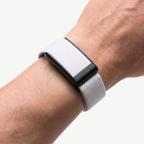 KnitLoop Band Snow — worn on wrist