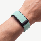KnitLoop Band Mint — worn on wrist